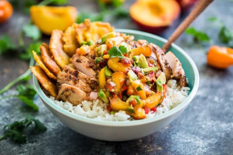 A bowl of Caribbean Jerk Chicken with Peach Avocado Salsa.