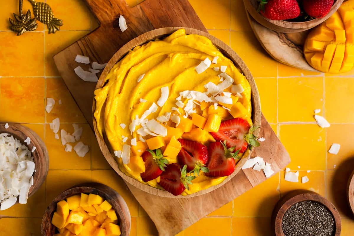 A bowl of Creamy Mango Smoothie Bowl.