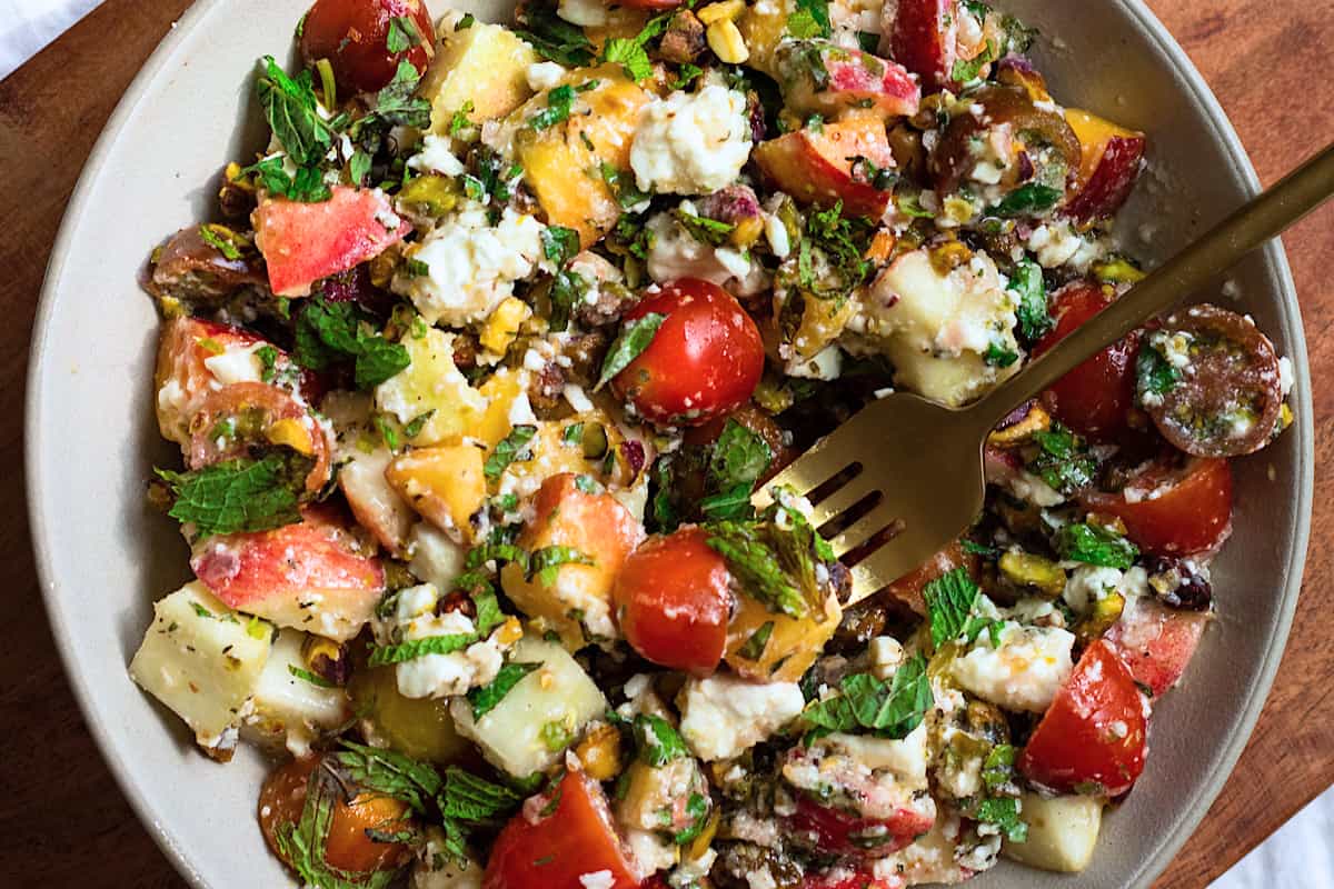 A bowl of Peach Tomato Salad with Feta.