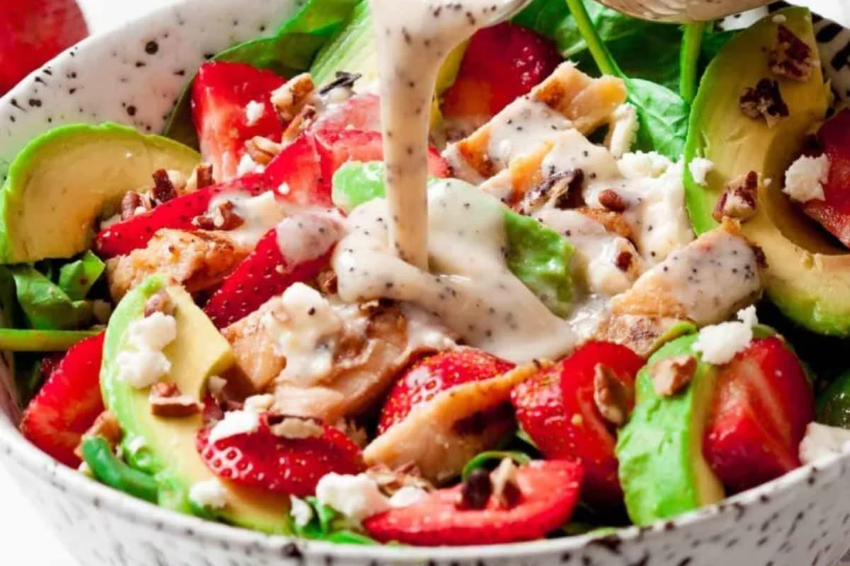 A bowl of Strawberry Chicken Salad with Poppyseed Dressing.