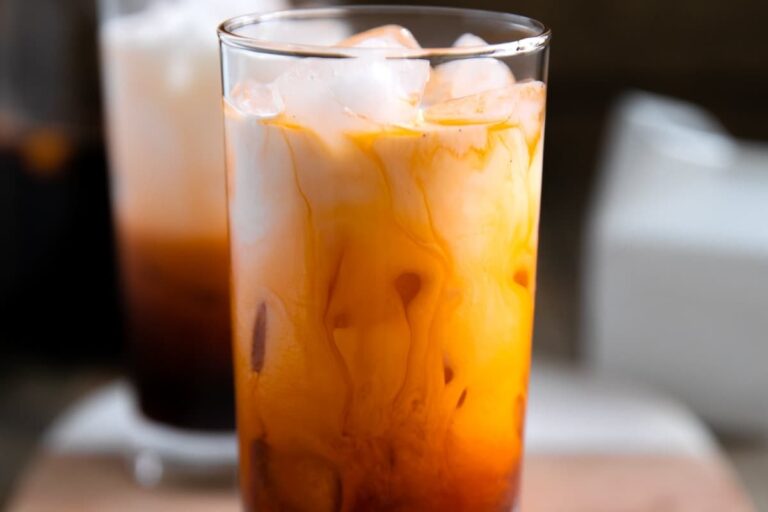 A glass of Thai Iced Tea (Thai Tea).