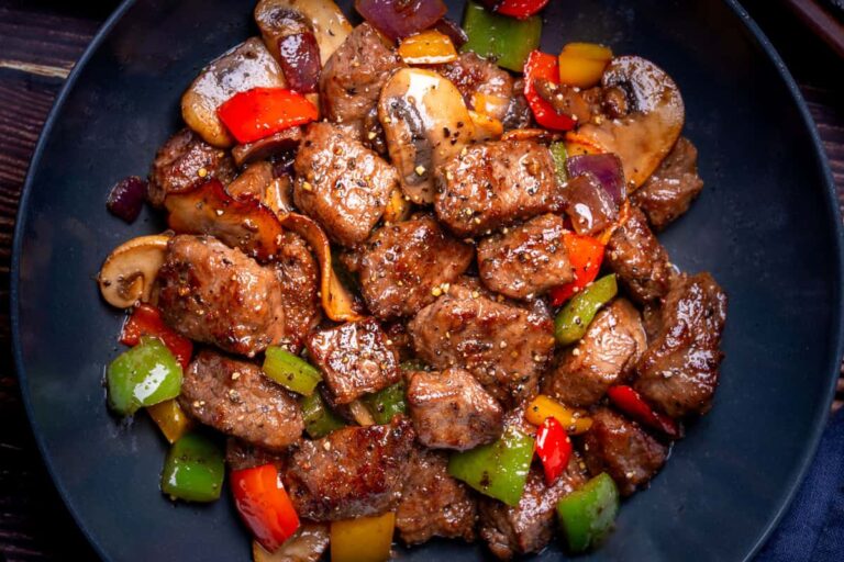 A dish of Chinese Steak Bites with Black Pepper Sauce.