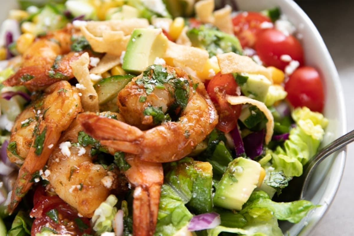 A bowl of Chopped Salad with Shrimp.