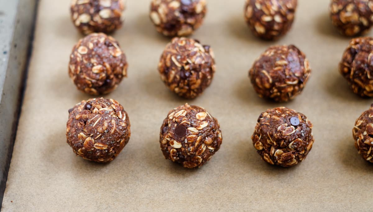A tray of no bake chocolate oat balls.