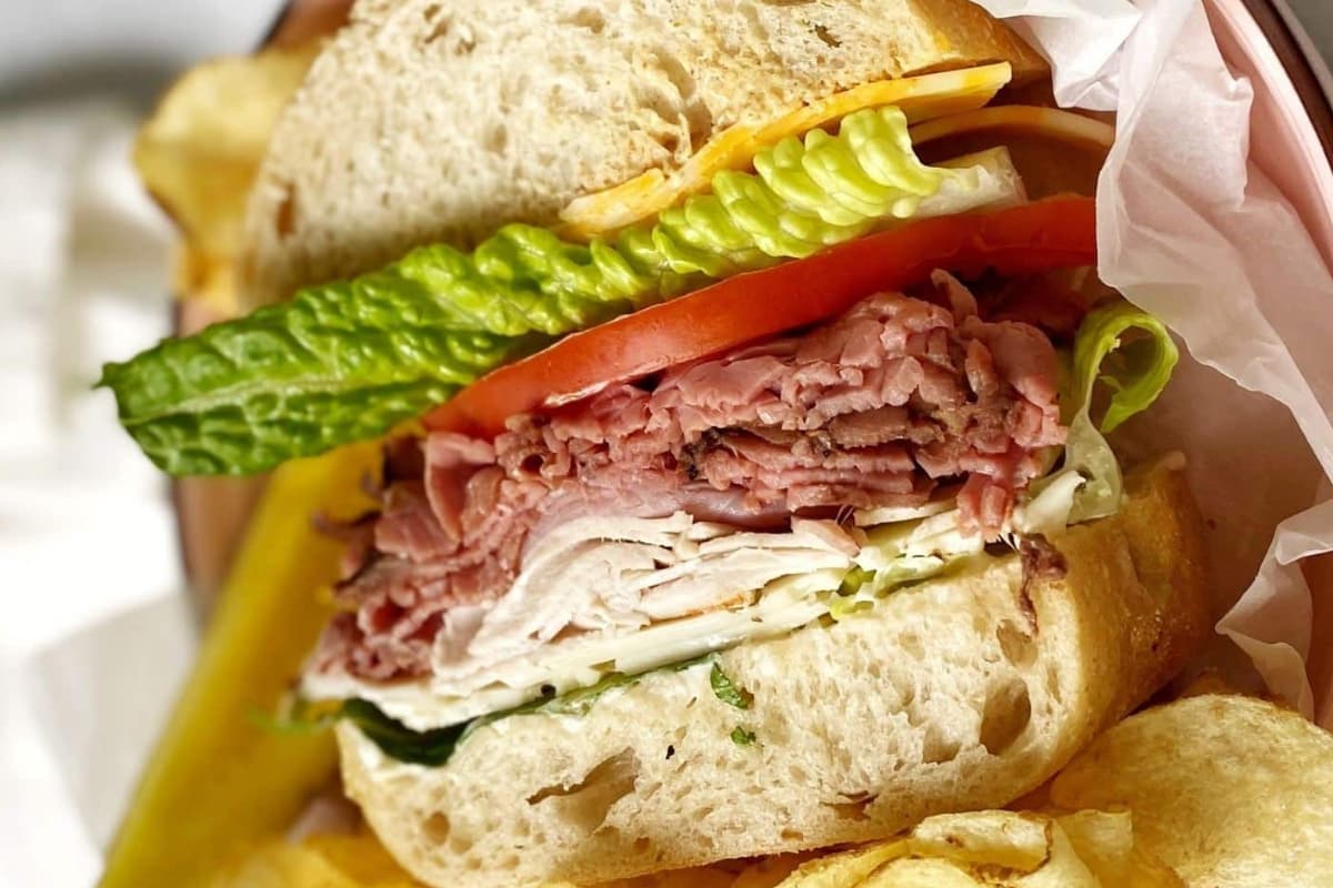 A plate of Cold Cut Sub Sandwich.