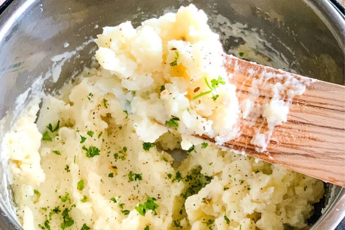 A pot of Instant Pot No Drain Mashed Potatoes.