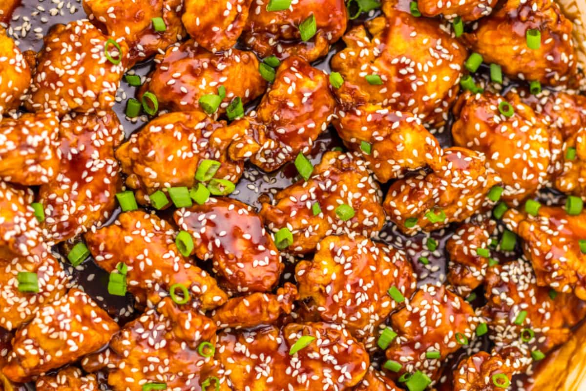 A tray of Crispy Honey Sesame Chicken.