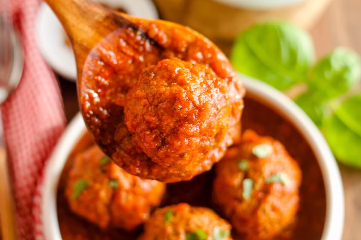 A dish of Mom's Homemade Meatballs and Sauce.