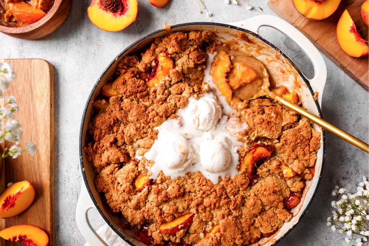 A dish of Vegan Oat Flour Peach Cobbler.