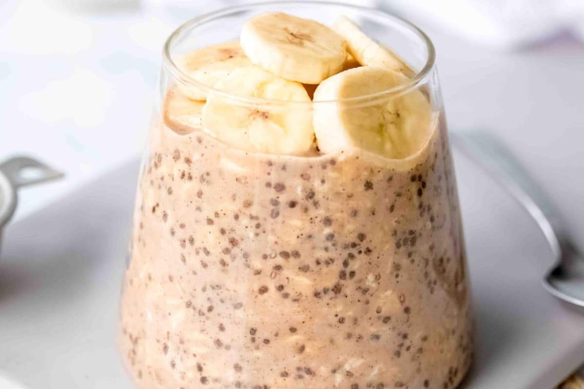 A glass of Peanut Butter Protein Overnight Oats.