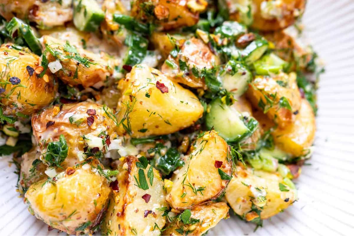 A plate of Roasted Potato Salad with Fresh Herbs.