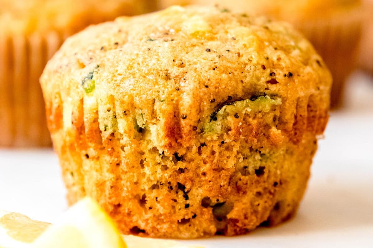A plate of Healthy Lemon Zucchini Muffins.