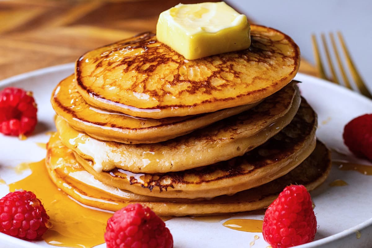 A plate of Lemon Honey Cottage Cheese Oat Pancakes.