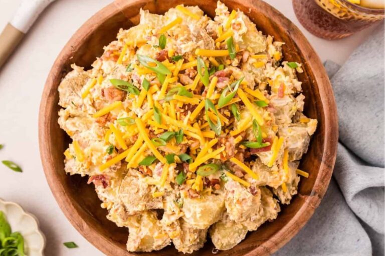 A bowl of Loaded Potato Salad.