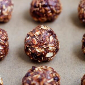 A tray of no bake chocolate oat balls.