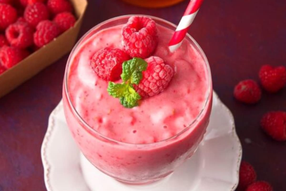 A glass of Raspberry Greek Yogurt Smoothie.