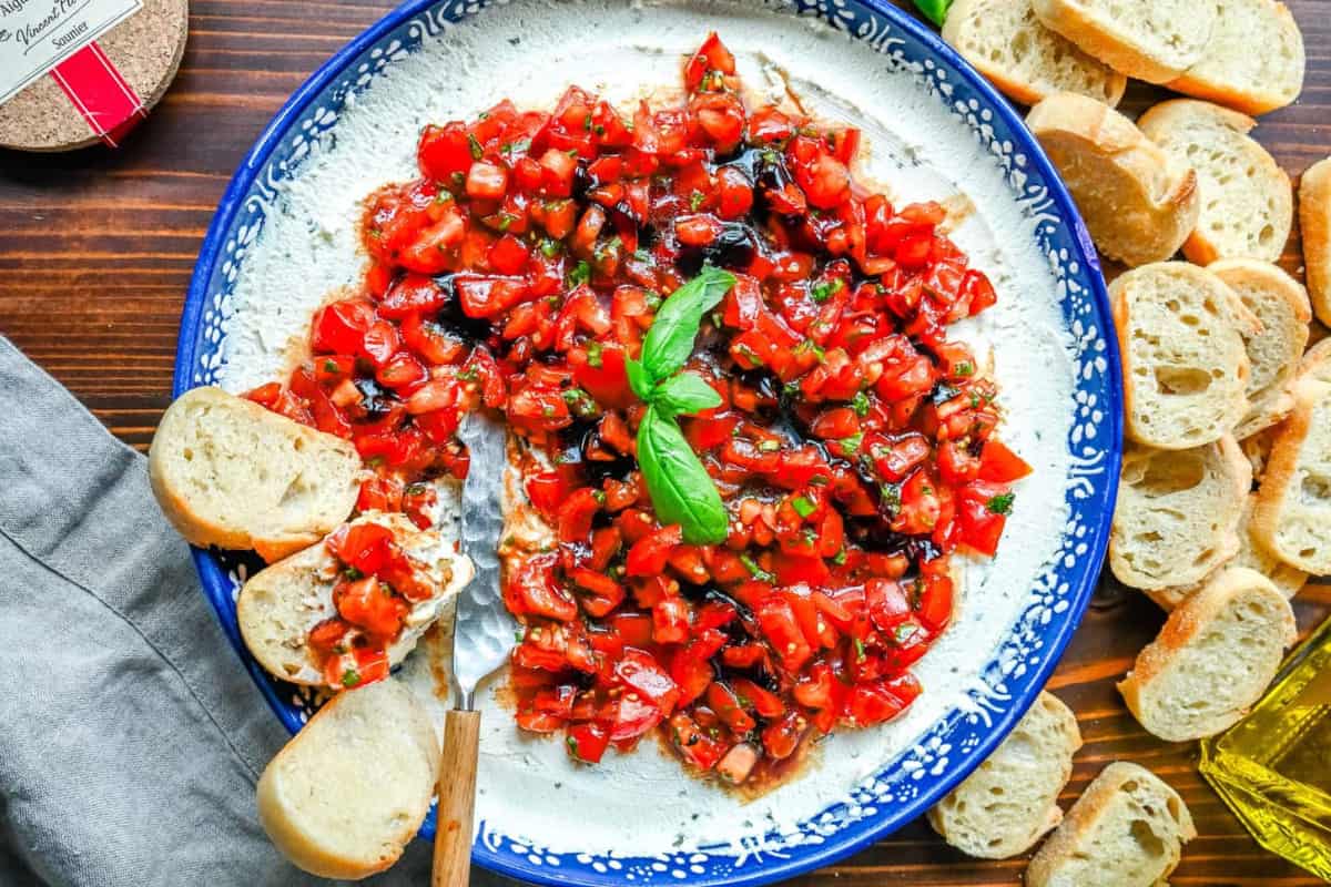 A dish of Caprese Dip with Boursin Cheese.