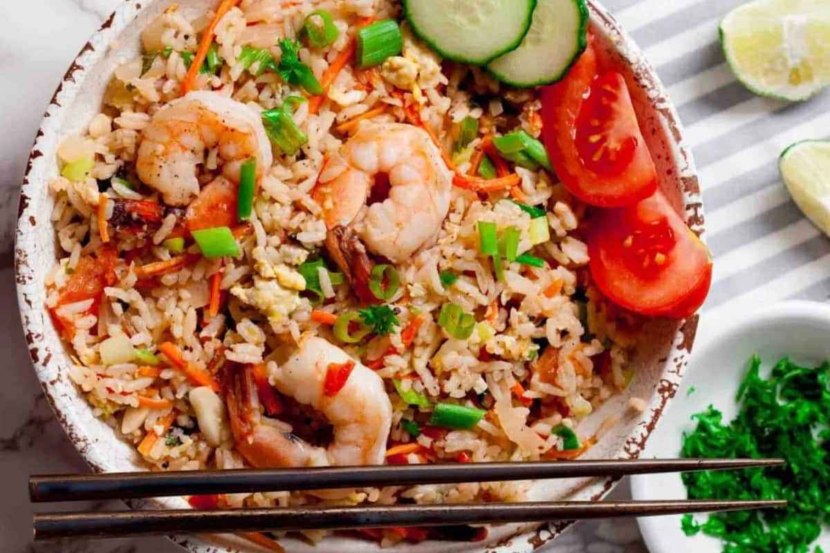 A bowl of Thai Fried Rice with Shrimp.