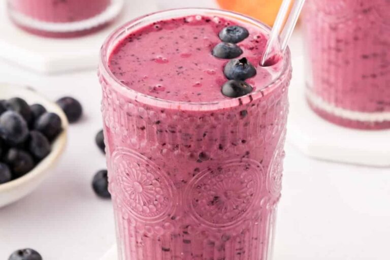A glass of Apple Blueberry Smoothie.