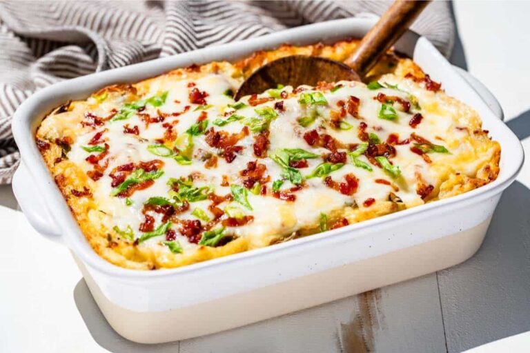 A dish of Cheesy Baked Mashed Potatoes.