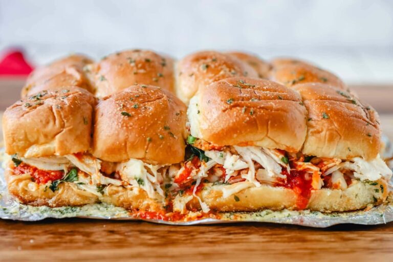 A plate of Baked Chicken Parm Sliders.