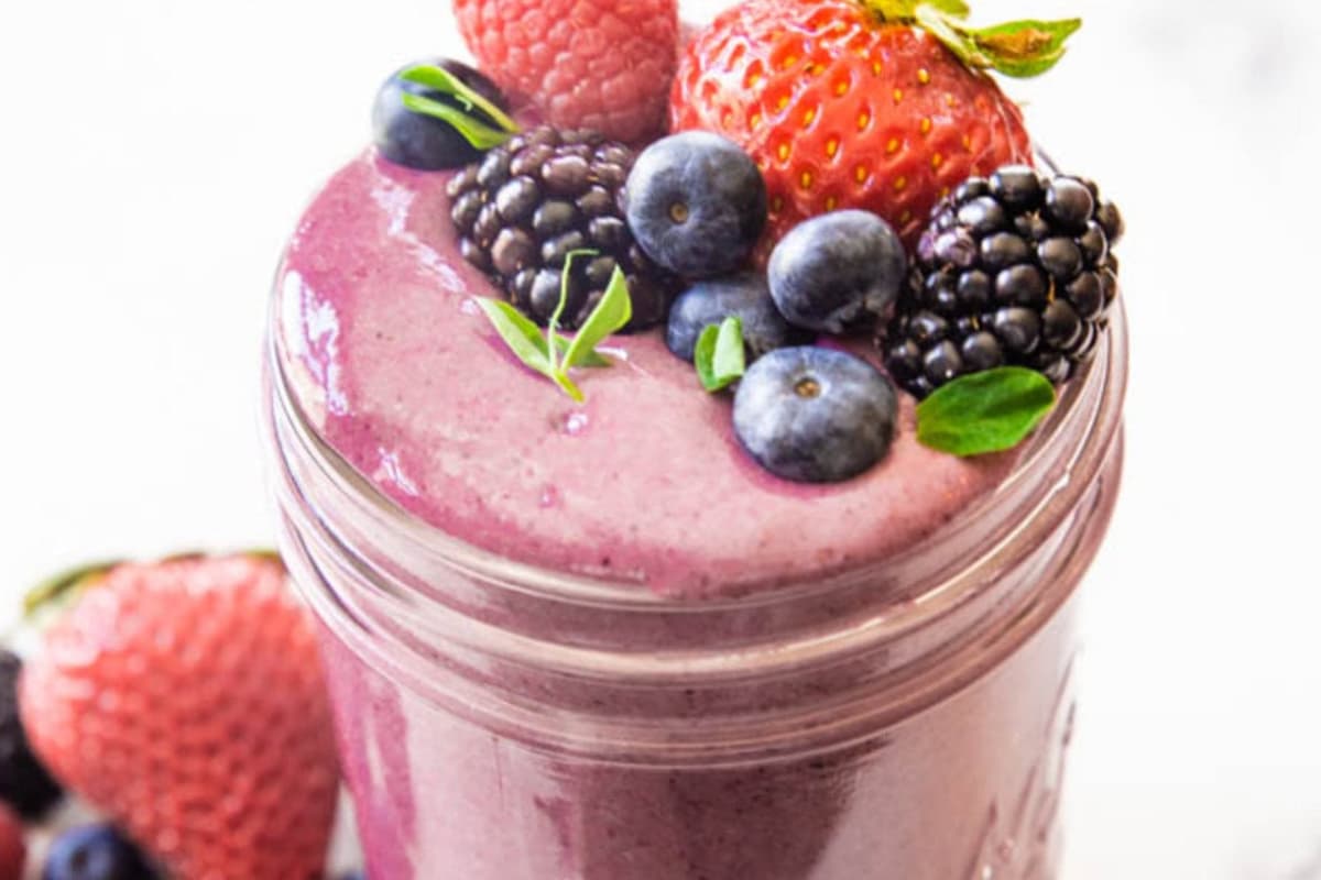 A glass of mixed perry protein smoothie.