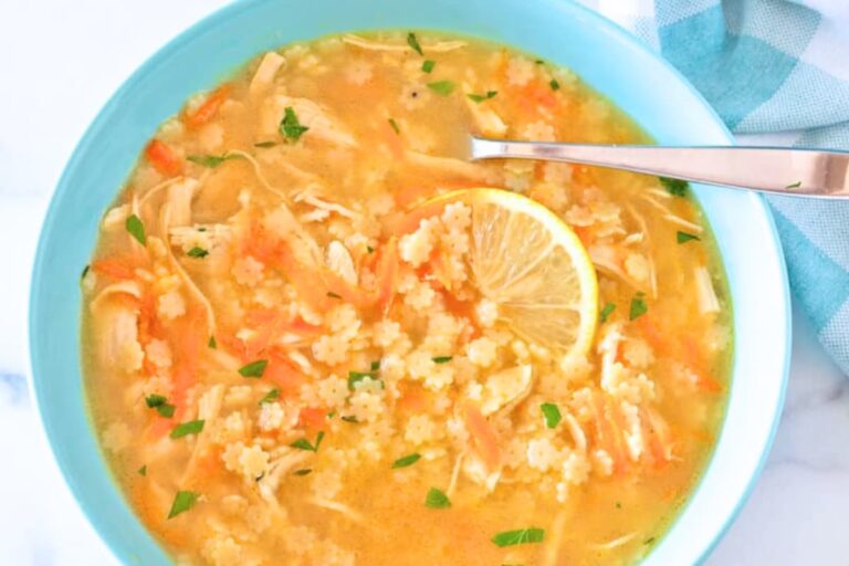 A bowl of chicken pastina soup.