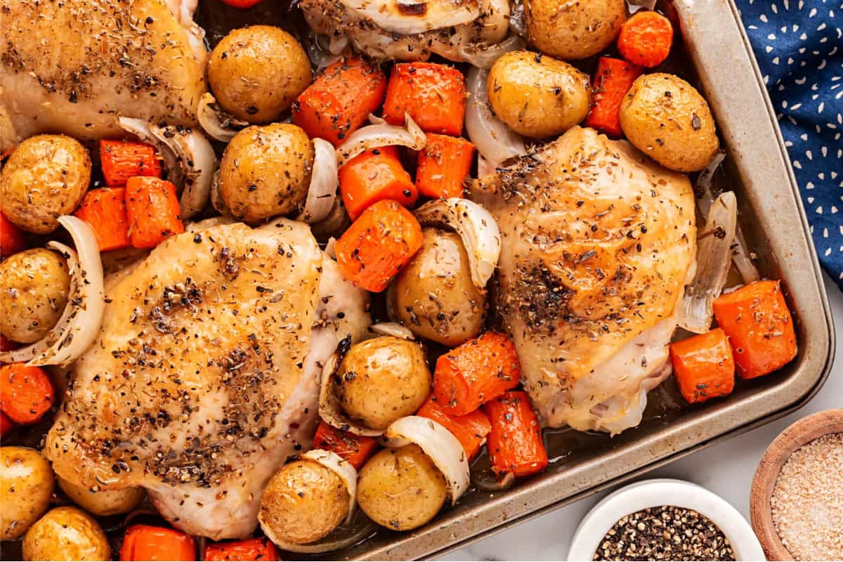 A dish of Roasted Sheet Pan Chicken Thighs.