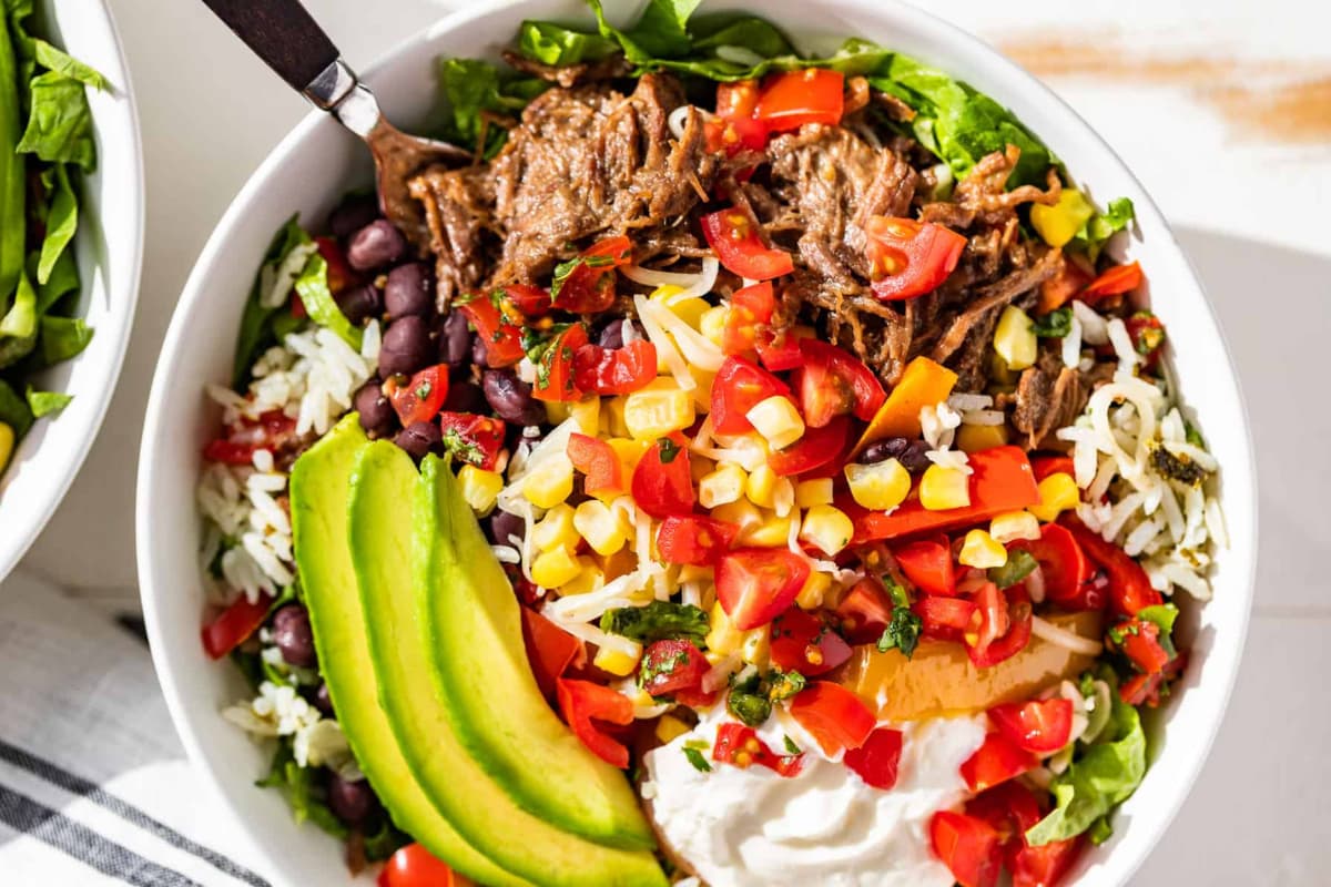 A bowl of Barbacoa Burrito Bowls.
