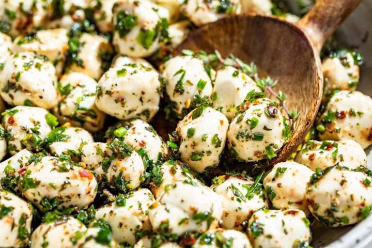 A bowl of Marinated Mozzarella Balls.