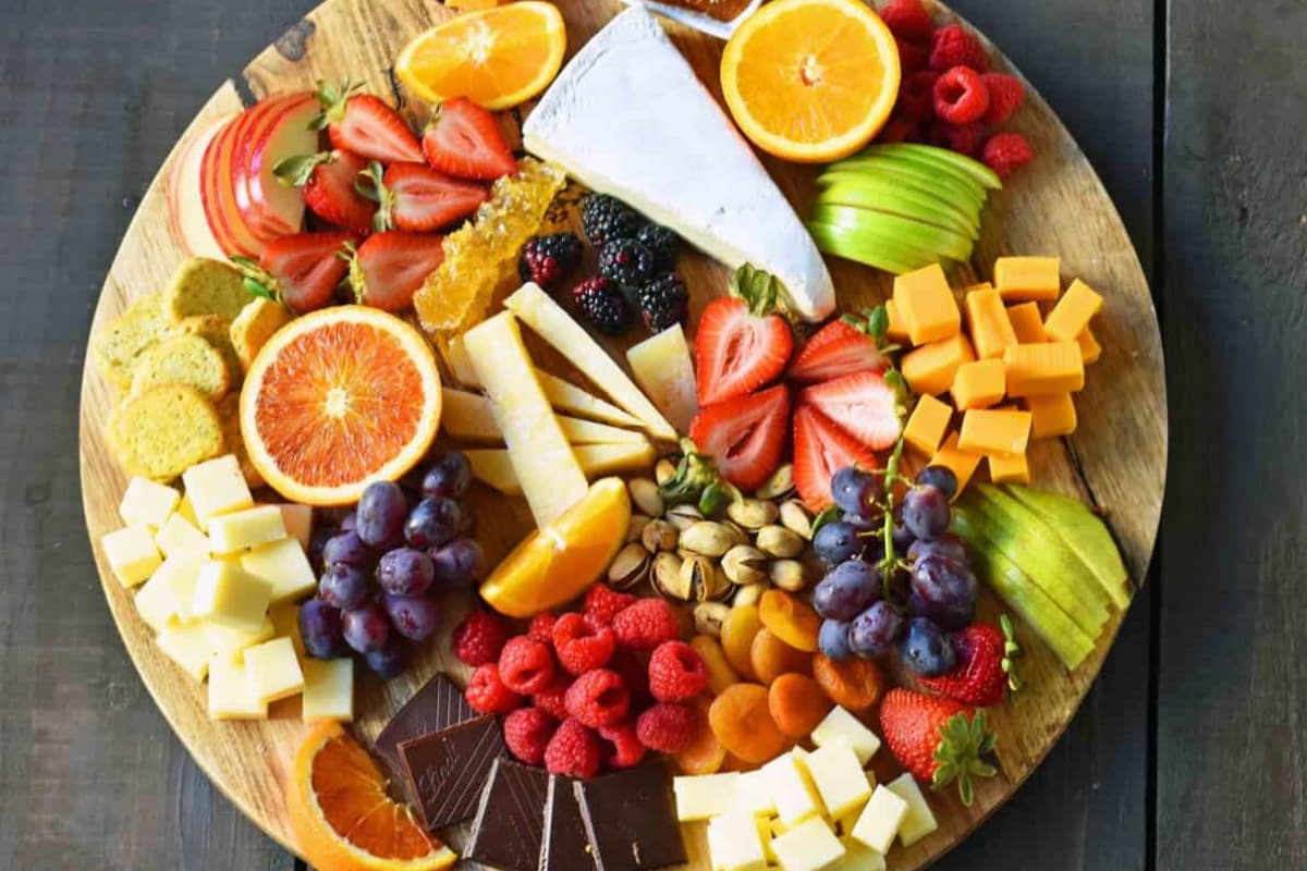 A platter of Fruit and Cheese Board.