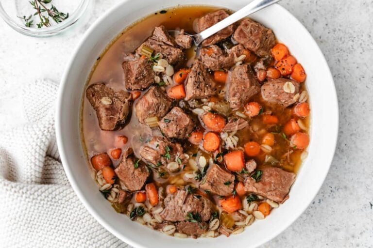 A bowl of Instant Pot Beef and Barley Soup.