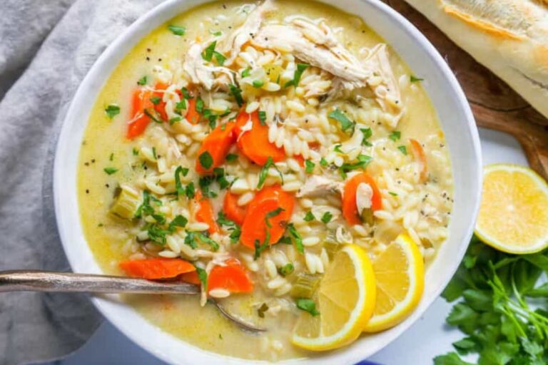 A bowl of Lemon Chicken Orzo Soup.
