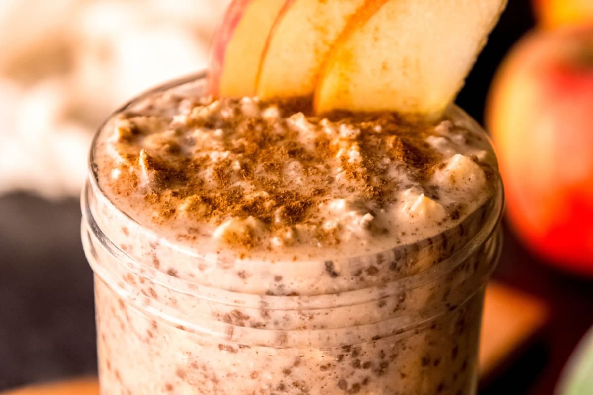 A jar of High Protein Apple Cinnamon Overnight Oats.