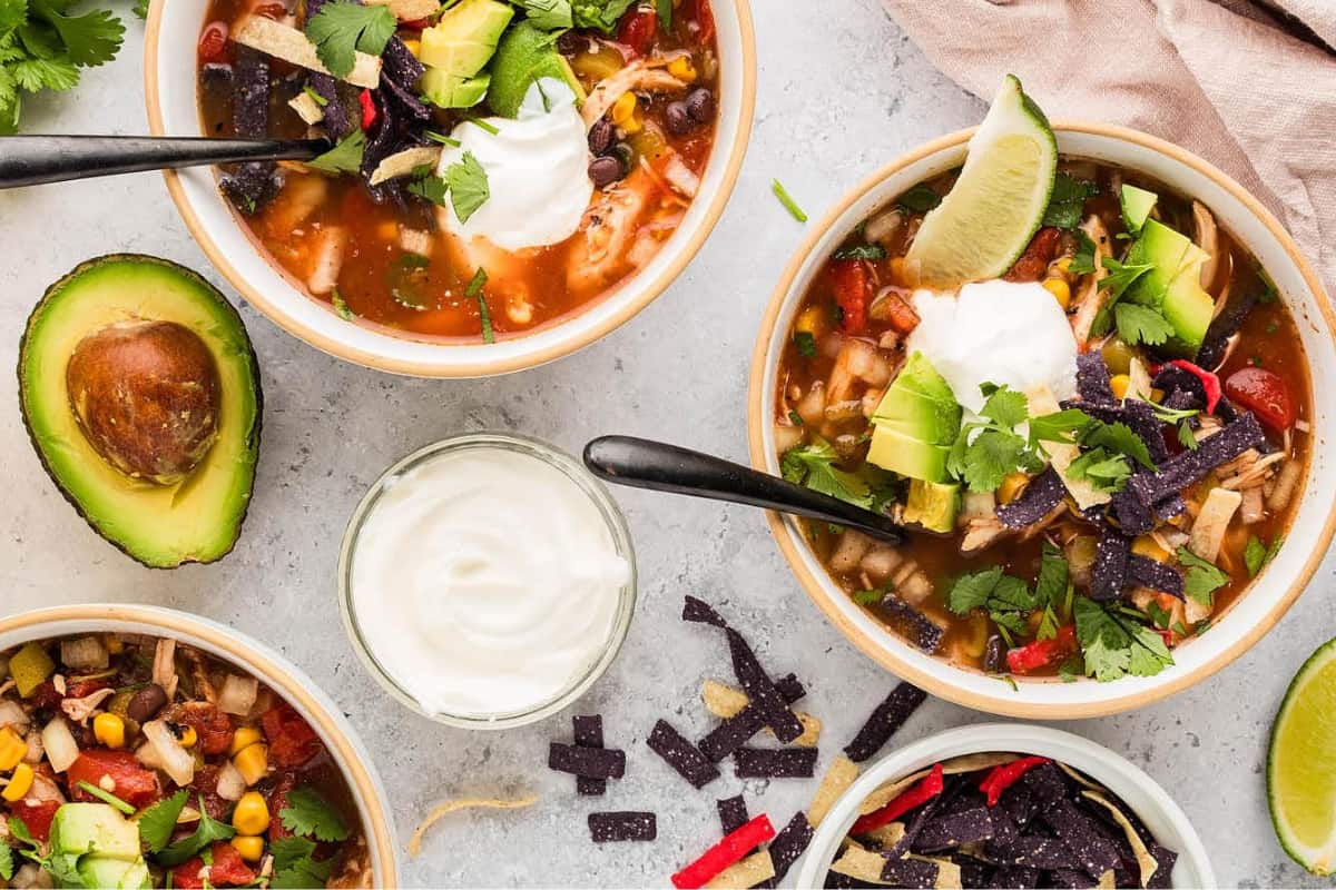 A bowl of Slow Cooker Chicken Tortilla Soup.