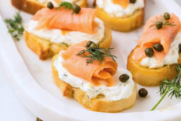 A plate of Smoked Salmon Crostini.
