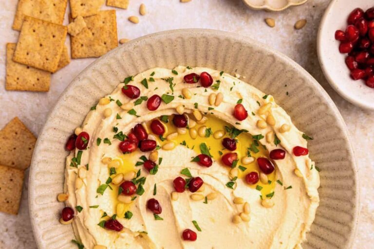 A bowl of Toasted Pine Nut Hummus.
