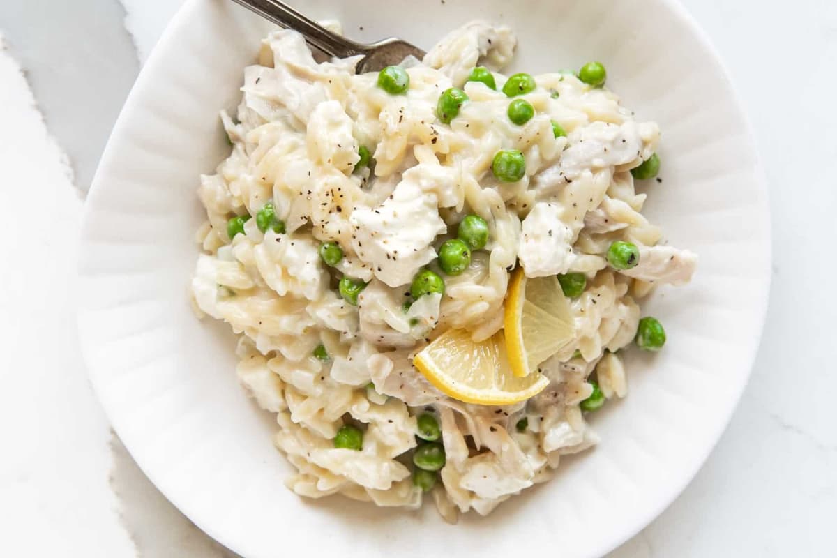 A bowl of Creamy Lemon Chicken Orzo.