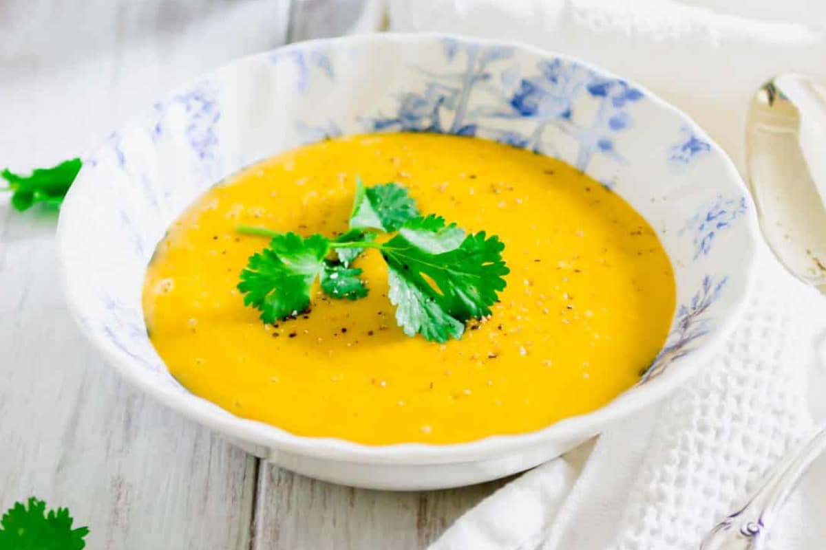 A bowl of Blender Pumpkin Potato Soup.