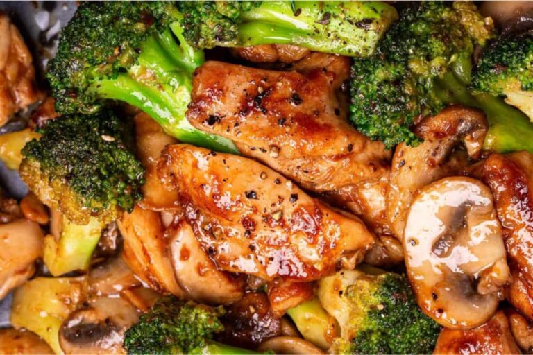 A plate of Chinese Chicken Broccoli Mushroom Stir Fry.
