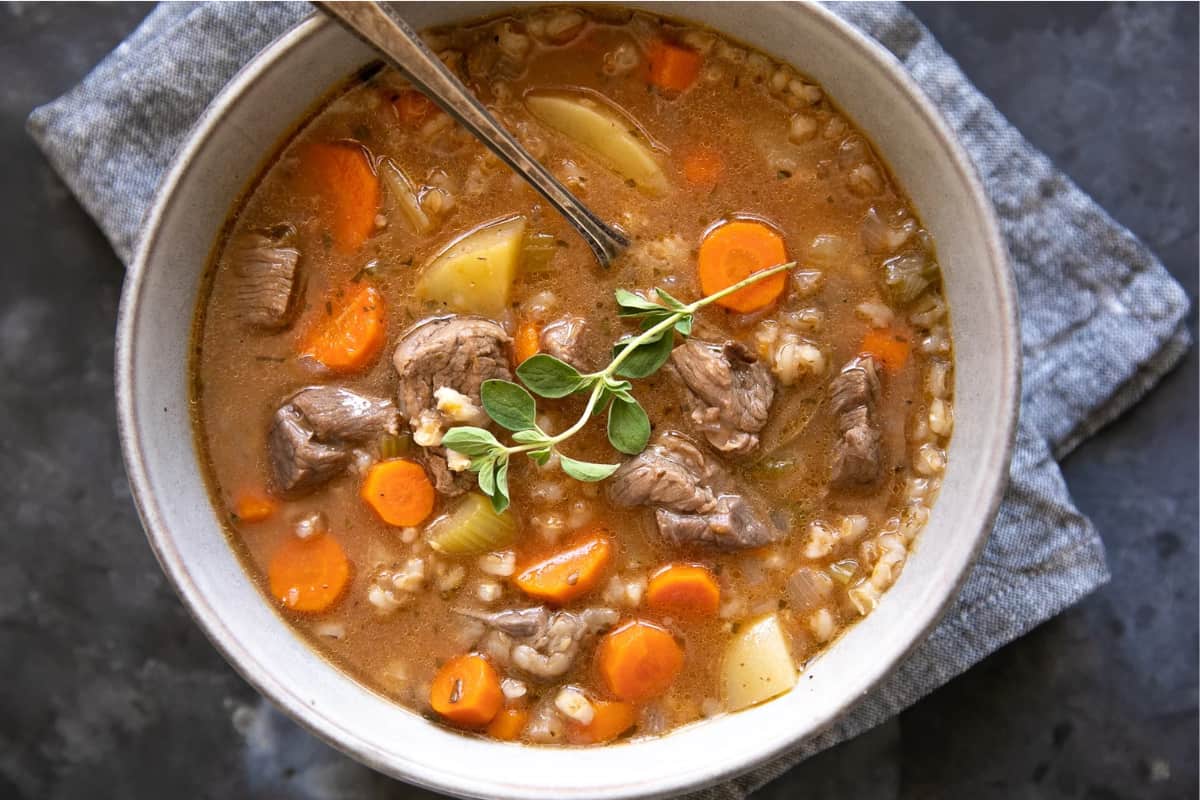 A bowl of Beef Barley Potato Soup.