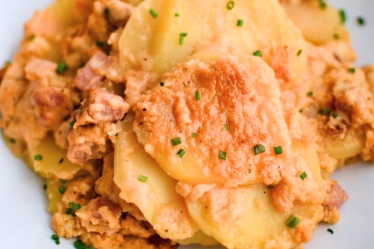 A plate of Scalloped Potatoes and Ham.