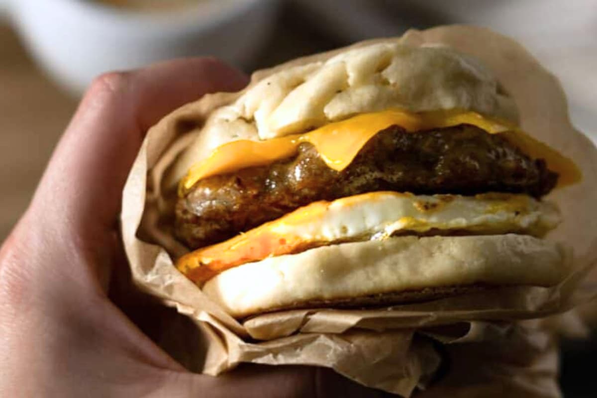 A plate of chicken sausage breakfast sandwiches.