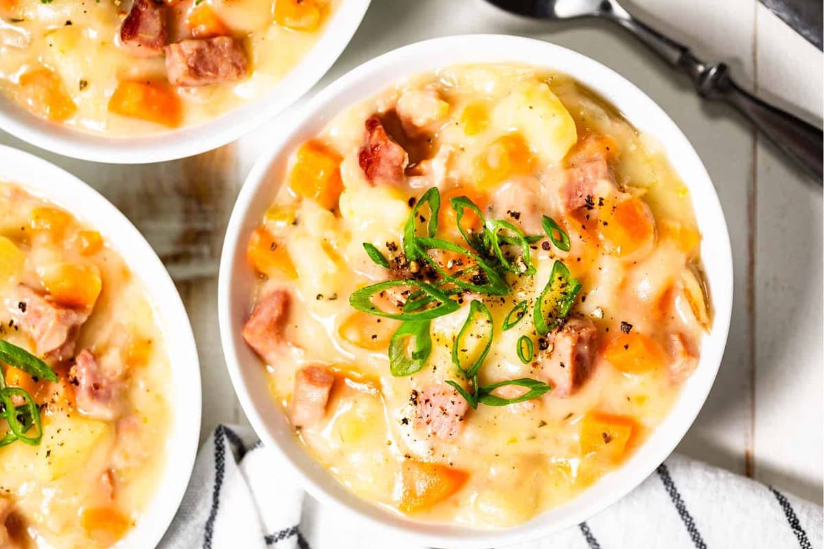 A bowl of Creamy Slow Cooker Ham and Potato Soup.