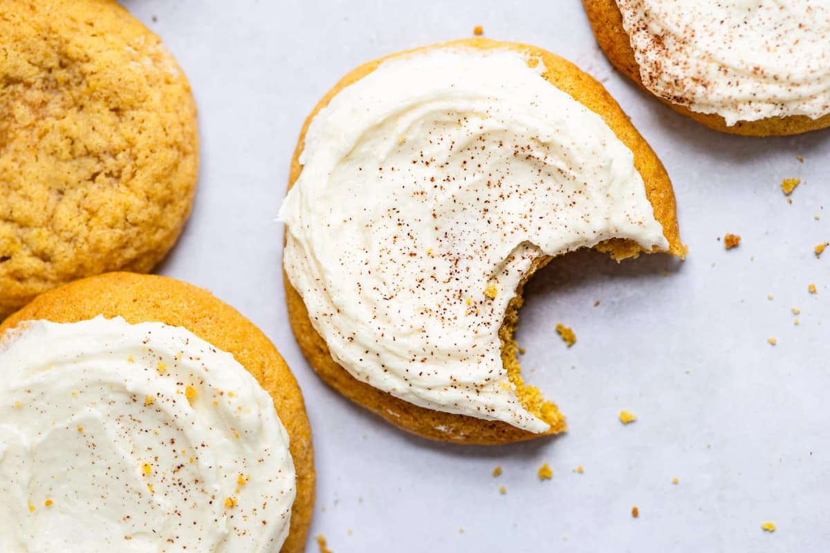 A plate of Frosted Pumpkin Cookies.