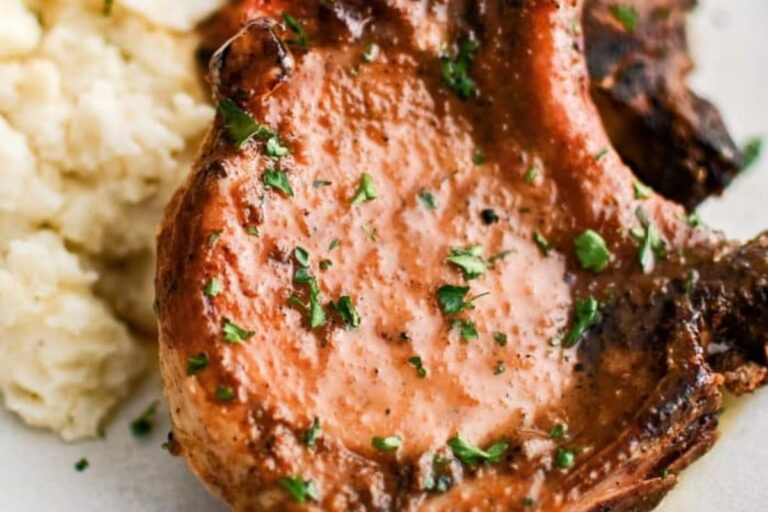 A plate of The Best Baked Pork Chops.