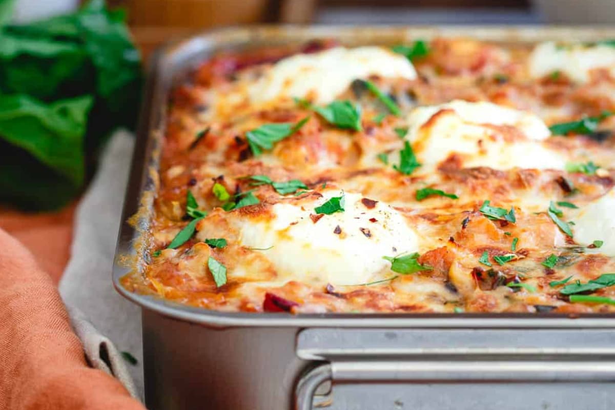 A dish of Turkey Sausage Spaghetti Squash with Mushrooms.