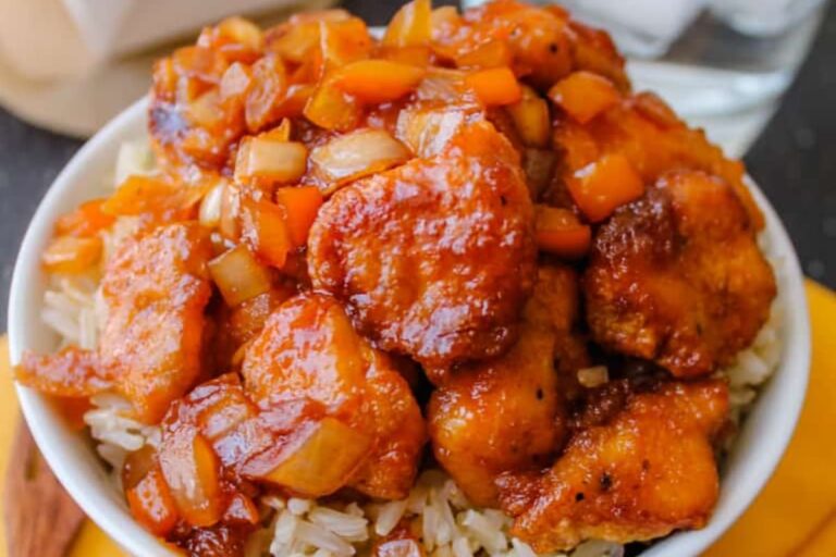 A bowl of Gluten Free Sweet and Sour Chicken.