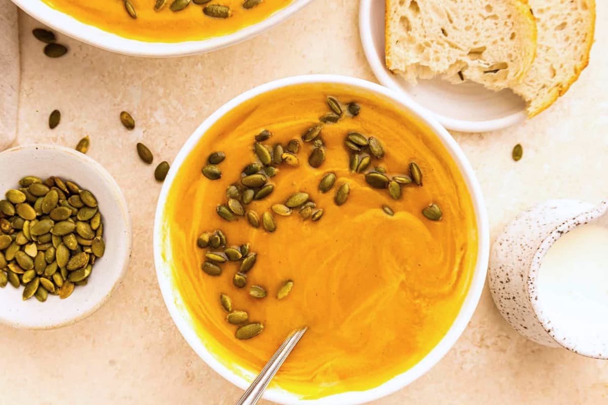 A bowl of Creamy Sweet Potato Ginger Soup.