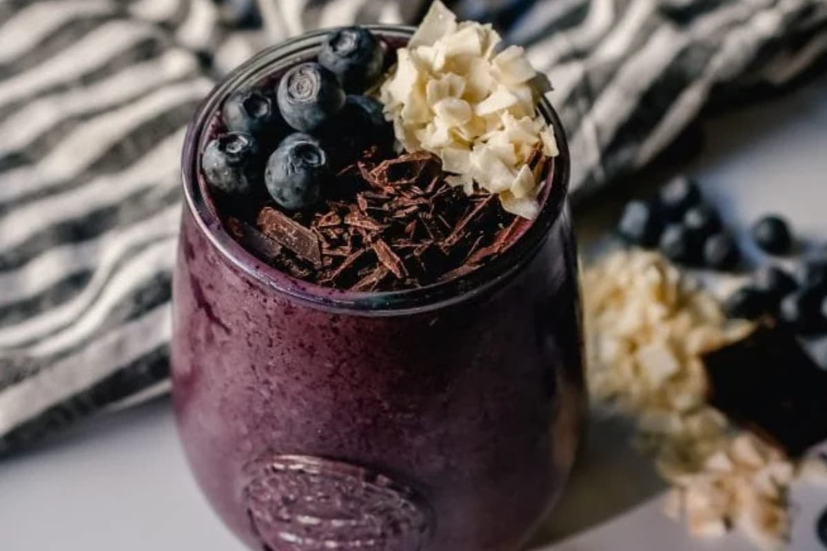 A glass of Blueberry Chocolate Smoothie.